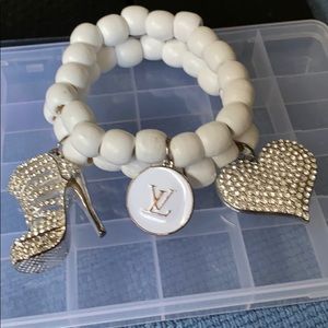 Beaded bracelet with charms
